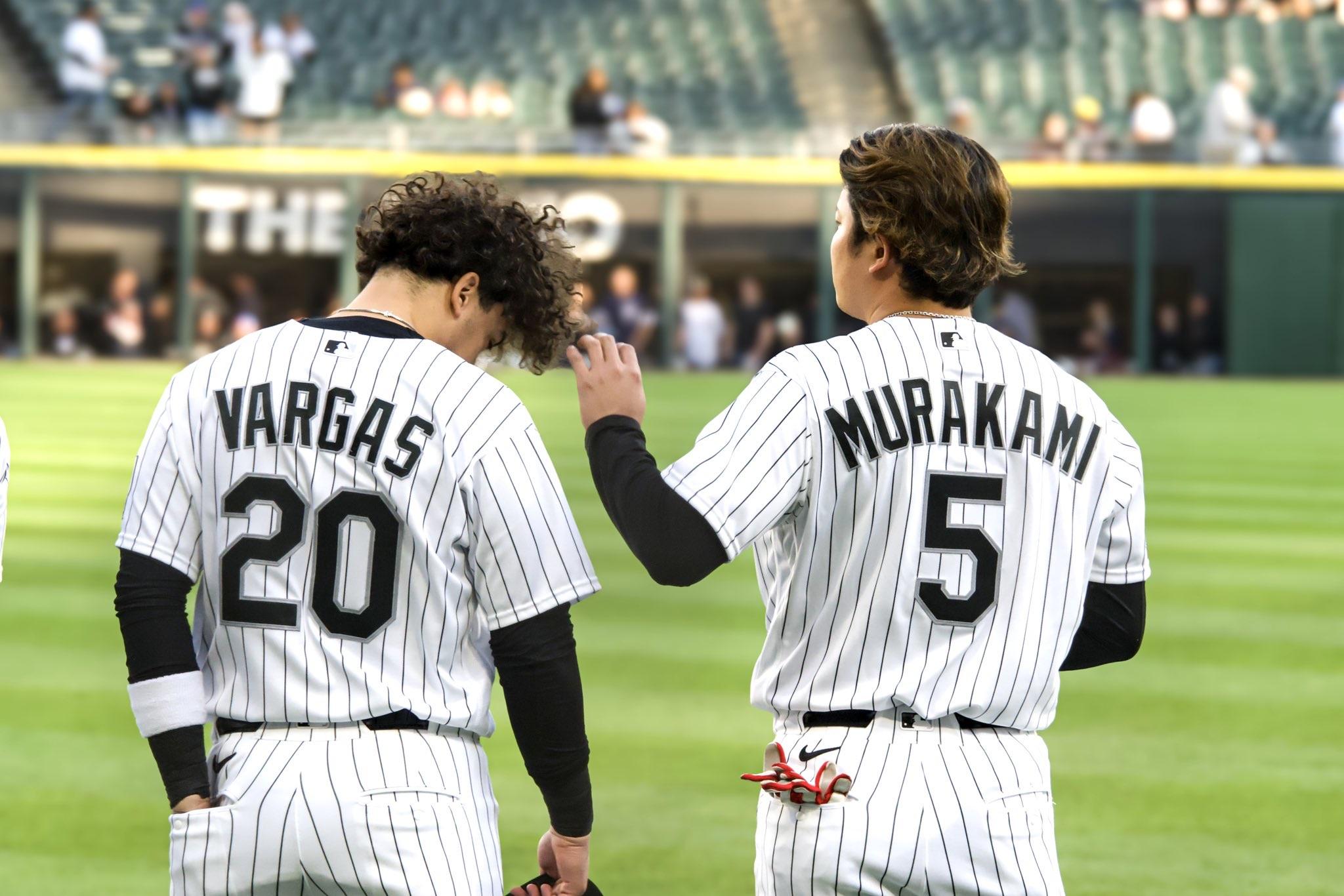 Munetaka Murakami playing with Miguel Vargas’ hair